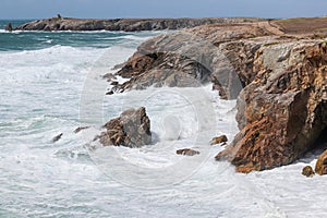 Spectacular natural cliffs on coastline Cote Sauvage, Quiberon, Brittany photo