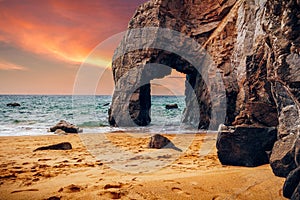 Spectacular natural cliffs and stone arch Arche de Port Blanc an