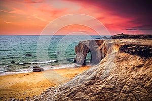 Spectacular natural cliffs and stone arch Arche de Port Blanc an photo