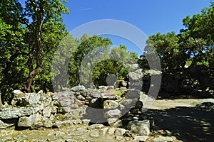 The spectacular Nuragic Complex of Romanzesu immersed in cork woods. Province of Nuoro, Sardinia. Italy