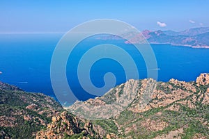 Spectacular panorama with the red rocks in the north of the island Corsica in France, near Piana photo