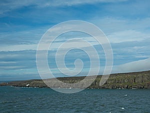 Expeditions cruise in the arctic ocean with view of die mountain landscape. Svalbard. photo