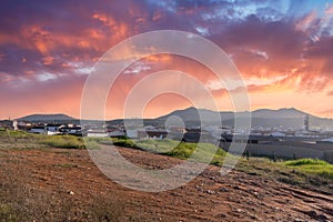 Spectacular rural landscape at sunset in the middle of the countryside with the pink sky