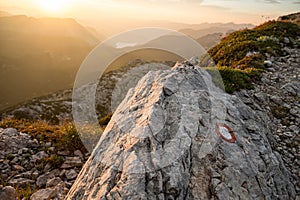 Spectacular sunrise with sun illuminated mountain views.