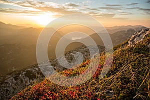 Spectacular sunrise with sun illuminated mountain views.