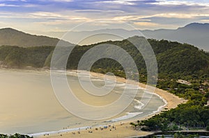 Spectacular sunset on the Barra do Una beach on the coast of the photo