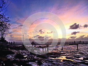 Spectacular sunset over the sea at Nightcliff, Darwin, NT Australia