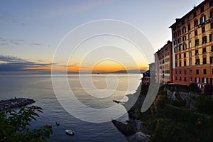 Spectacular sunset over the small port of Camogli