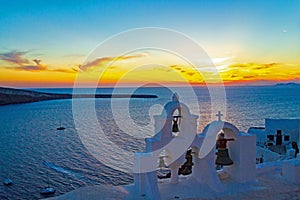 Spectacular sunset view and church belfry Oia Santorini Greece