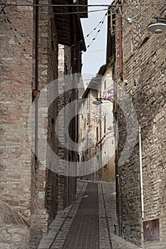 Spectacular traditional italian medieval alley in the historic center of beautiful little town of Spello