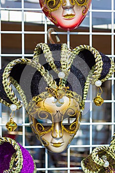 Spectacular Venice carnival masks on street stand display Italy