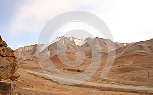 Spectacular view on snow-capped mountains in Gorno-Badakshan, the Pamir region of Tajikistan. photo