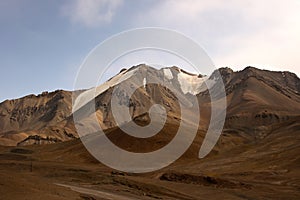 Spectacular view on snow-capped mountains in Gorno-Badakshan, the Pamir region of Tajikistan. photo