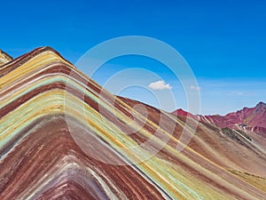 Spectacular view of the vivid colors of Vinicunca mountain on a bright sunny day, Cusco region, Peru photo