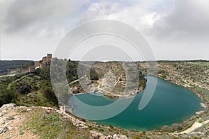 Spectacular viewpoint of the Jucar river surrounding the medieval village of Alarcon, Spain