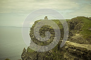 Spectacular views of the famous cliffs of Moher in County Clare, Ireland. O`Brien`s tower.