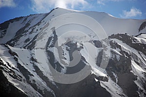 Spectacular white shining beautiful snow mountains in the distance photo