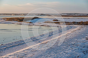 A spectacular winter landscape in the Russian countryside with waterfront. Surroundings of Taganrog photo