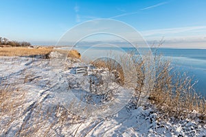 A spectacular winter landscape in the Russian countryside with waterfront. Surroundings of Taganrog photo