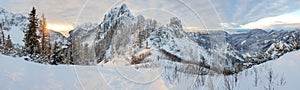 Spectacular winter mountain landscape illuminated by setting sun.