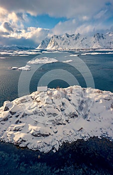 Spectacular winter view from flying drone of Sandvika bay, Leknes, Norway, Europe.