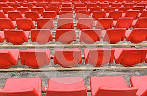 Spectator bleachers on an open soccer field. Stadium for summer football matches. Outdoor stadium