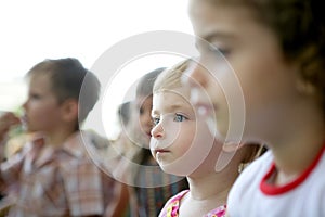 Spectator children looking at the show