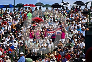 Spectators Pack the Pavilion - 18th Green