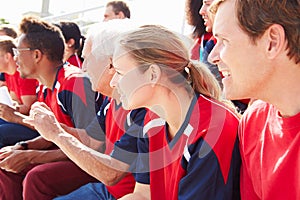 Spectators In Team Colors Watching Sports Event