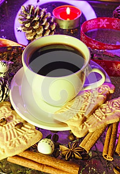 Speculaas biscuits on the table with christmas decoration and spices