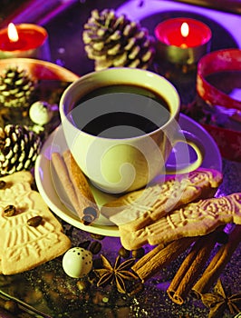 Speculaas biscuits on the table with christmas decoration and spices