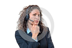 Speculative businesswoman wearing a headset