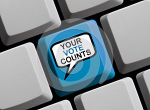 Speech Bubble on Computer Keyboard showing Your Vote Counts