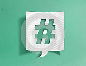 Speech bubble with hashtag symbol