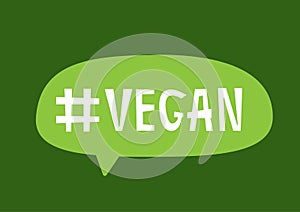 Speech bubble with hashtag Vegan.