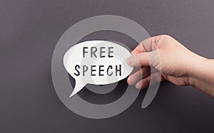 Speech bubble with the words free speech, cancel culture, having a different opinion, censorship