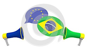 Speech bubbles with flags of Brazil and the EU and loudspeakers. Intercultural dialogue or international talks related