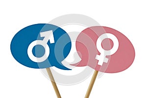Speech bubbles with male and female symbol - Concept od communication between men and women photo