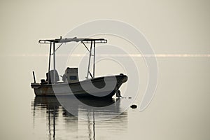 A Speed boat anchored at sea shore of Asker, Bahrain