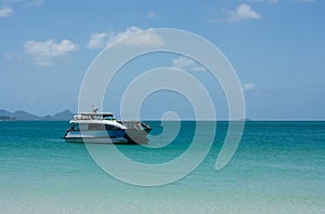 A speed boat anchored at the Whitehaven Beach in Whitsundays