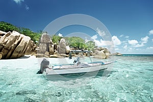 Speed boat on the beach of Coco Island