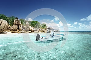 Speed boat on the beach of Coco Island