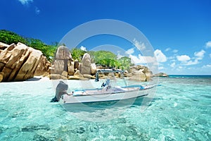 Speed boat on the beach of Coco Island