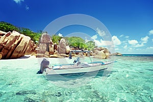 Speed boat on the beach of Coco Island