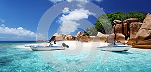 Speed boat on beach of Coco Island, Seychelles