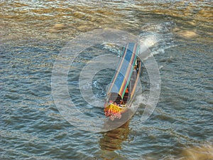 Speed boat in Chaophaya River photo