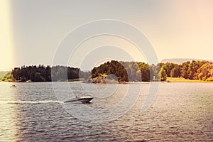 Speed boat cruising Oslo fjord in summer time