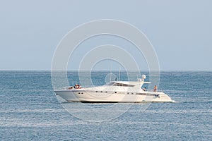 Speed boat cruising in the sea. Young people relaxing in a sea