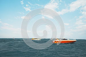 Speed boat floating in the ocean in summer.