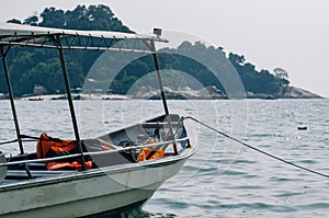 Speed boat for island hoping activities moored